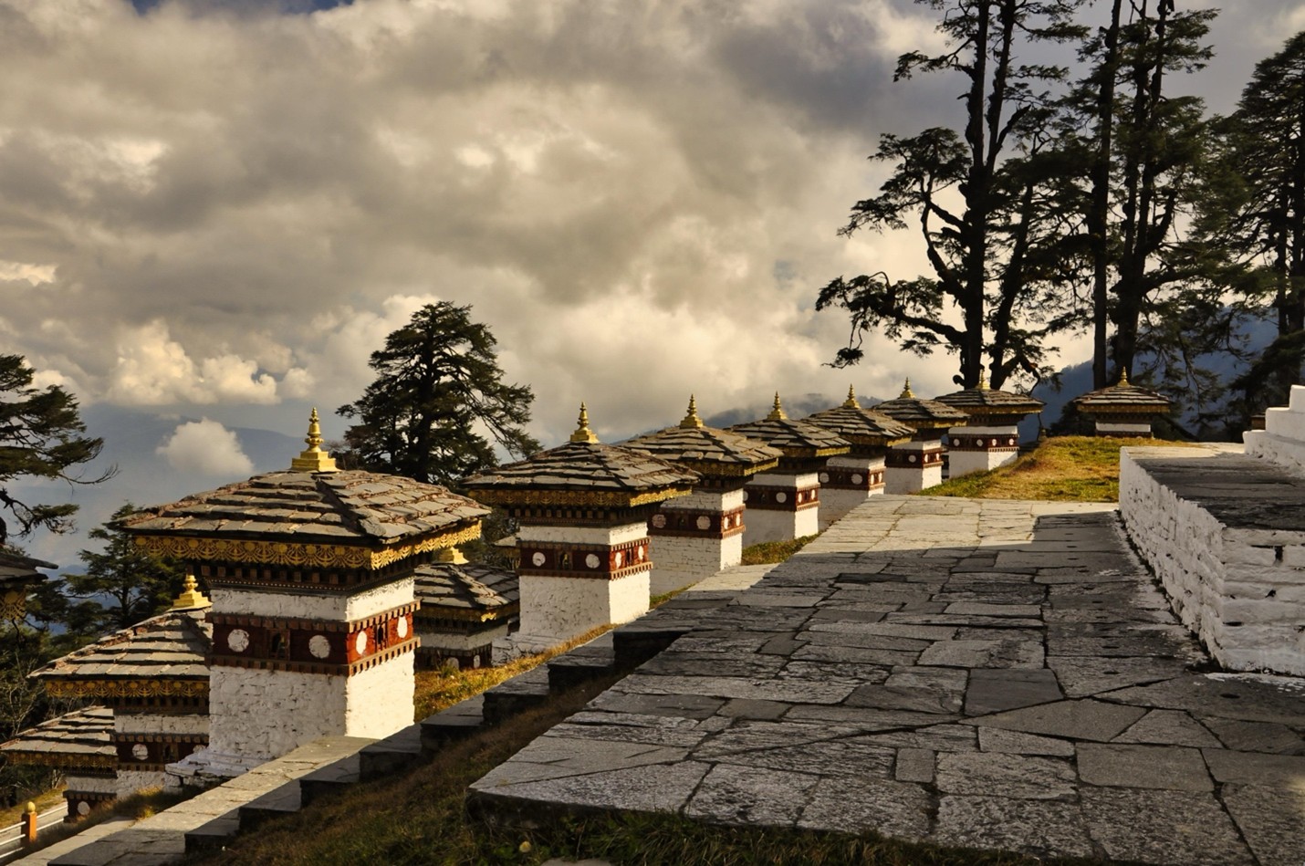 Stone walkway with a traditional wall in Dazu scenic area